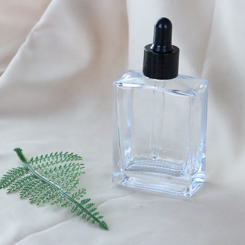 Luxury 30ml 50ml 100ml Square Clear Cosmetic Serum Glass Dropper Bottle for Essential Oil (GSA21)