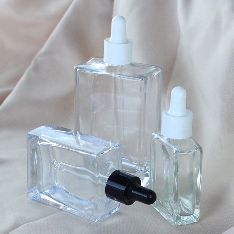 Luxury 30ml 50ml 100ml Square Clear Cosmetic Serum Glass Dropper Bottle for Essential Oil (GSA21)