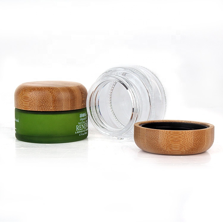 Luxury 50g cosmetic packaging green glass cream jars container with bamboo lids
