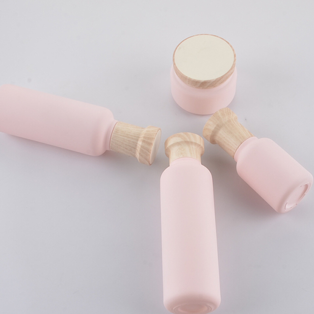 Luxury 50g wide mouth pink glass cosmetics set bottle glass Bottle jar wooden lid