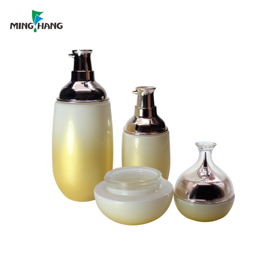 Luxury 50ml 100ml gold color skin care set luxury pink black cosmetics jars with unique plastic lid