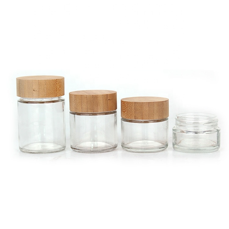 Luxury 50ml 60ml 90ml 100ml straight side glass jar for food cosmetic storage with bamboo wood lid