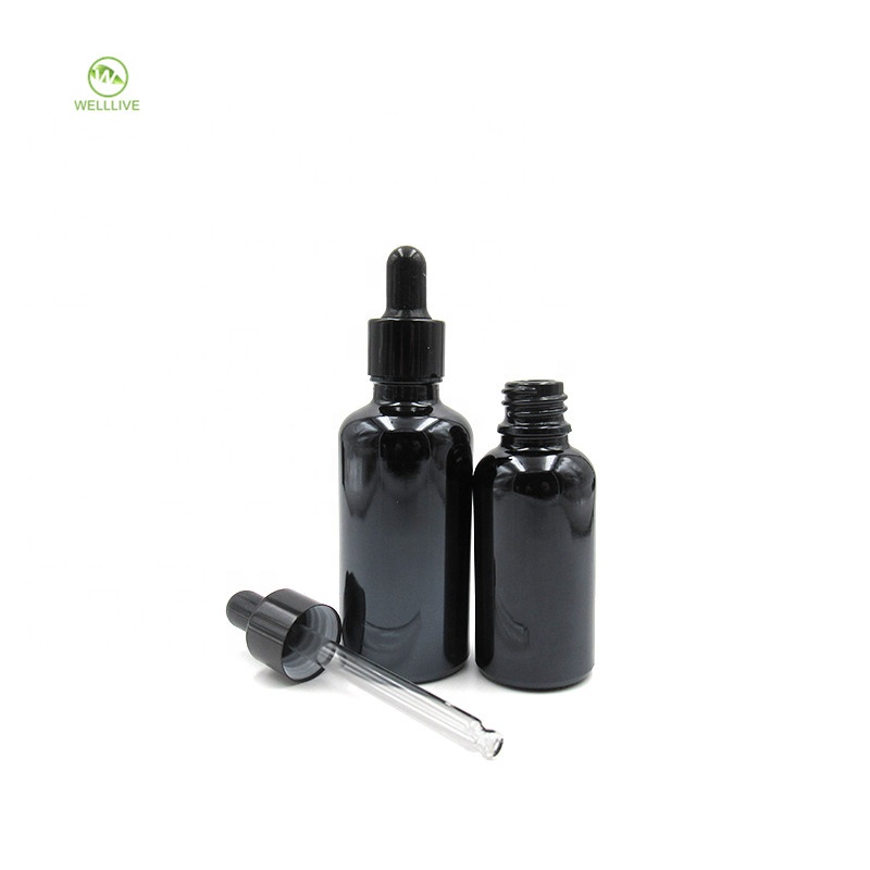 Luxury 5ml 10ml 15ml 20ml 30ml 50ml 100ml round black glass dropper bottle for massage oil packaging