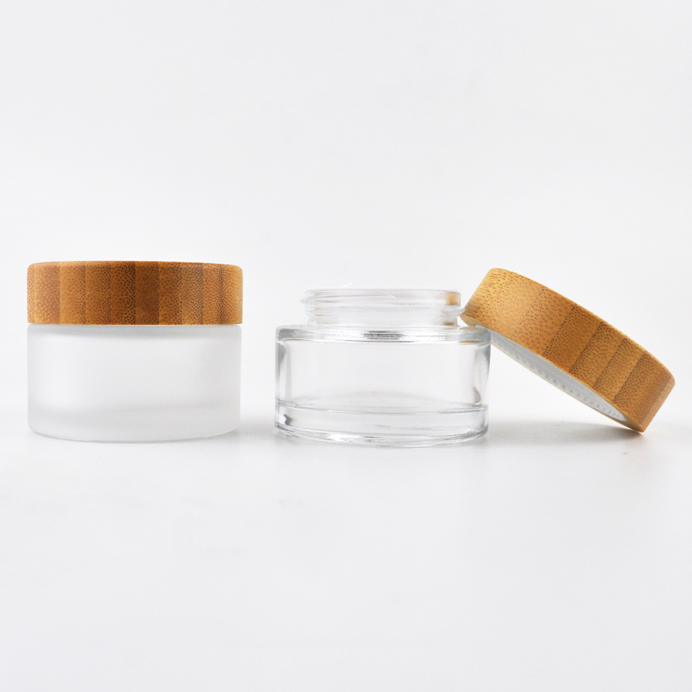 Luxury 5ml 15ml 30ml 50ml 100ml small transparent frosted glass jars with bamboo lids