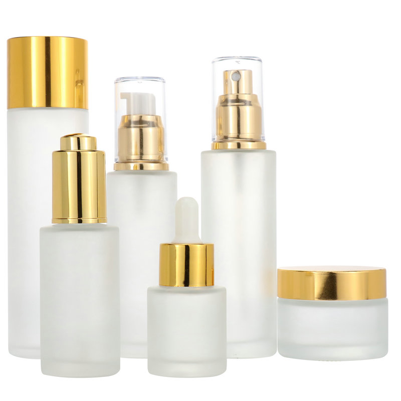 Luxury Aluminum 30ml 60ml 100ml120ml glass cosmetic packaging empty glass lotion bottle spray pump container skincare bottle set