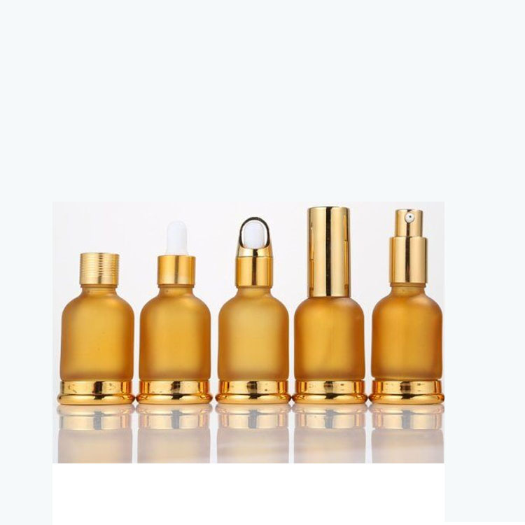 Luxury Custom Logo gold glass essential oil bottle 10 ml glass dropper bottle essential oil bottle with glass dropper