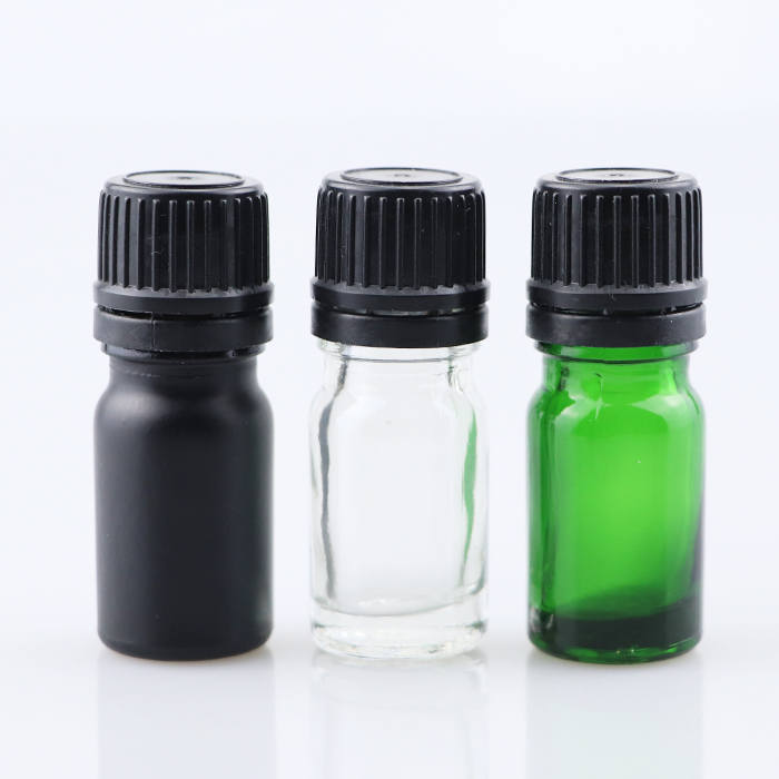 Luxury New Design clear green blue amber Color Glass essential oil Bottles with plug and tamper cap