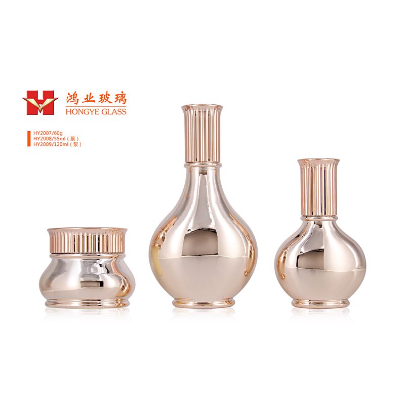 Luxury Packaging champagne gold color empty cosmetic sets spray glass bottle with pump HY2007