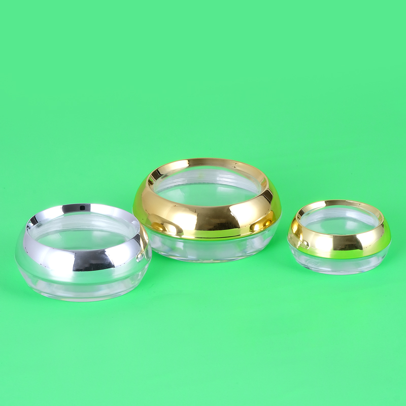 Luxury Rounded capsule jar transparent cosmetic jar packaging decorated with gold trim