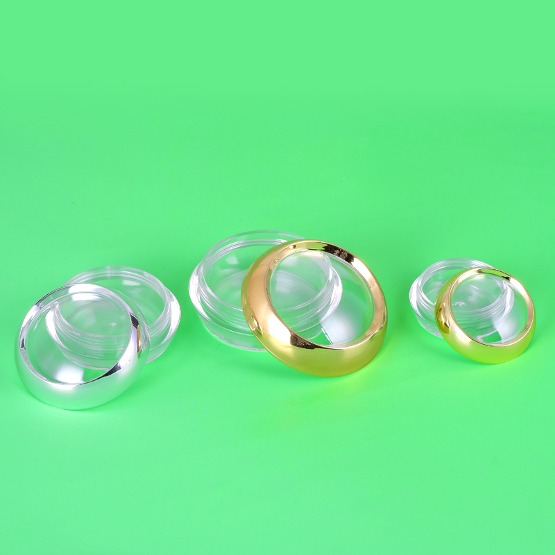 Luxury Rounded capsule jar transparent cosmetic jar packaging decorated with gold trim