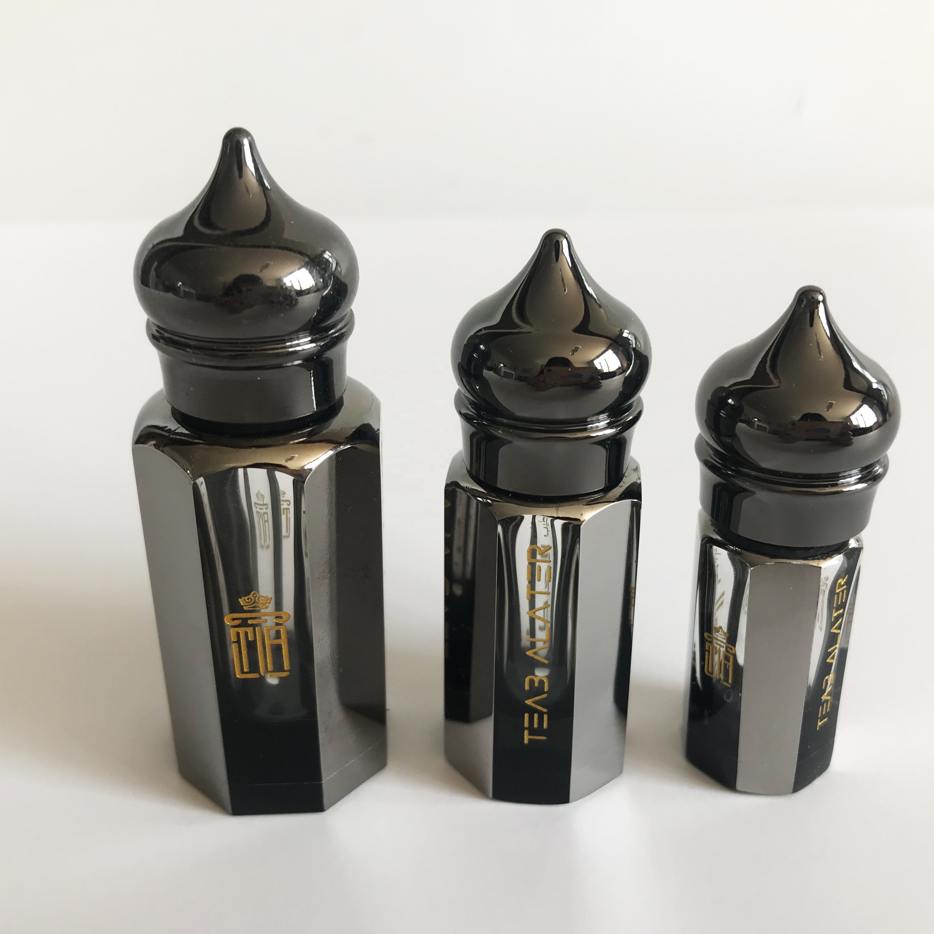 Luxury black coated octagonal shape arabian attar oud essential oil glass bottle with super metal lids and glass stick