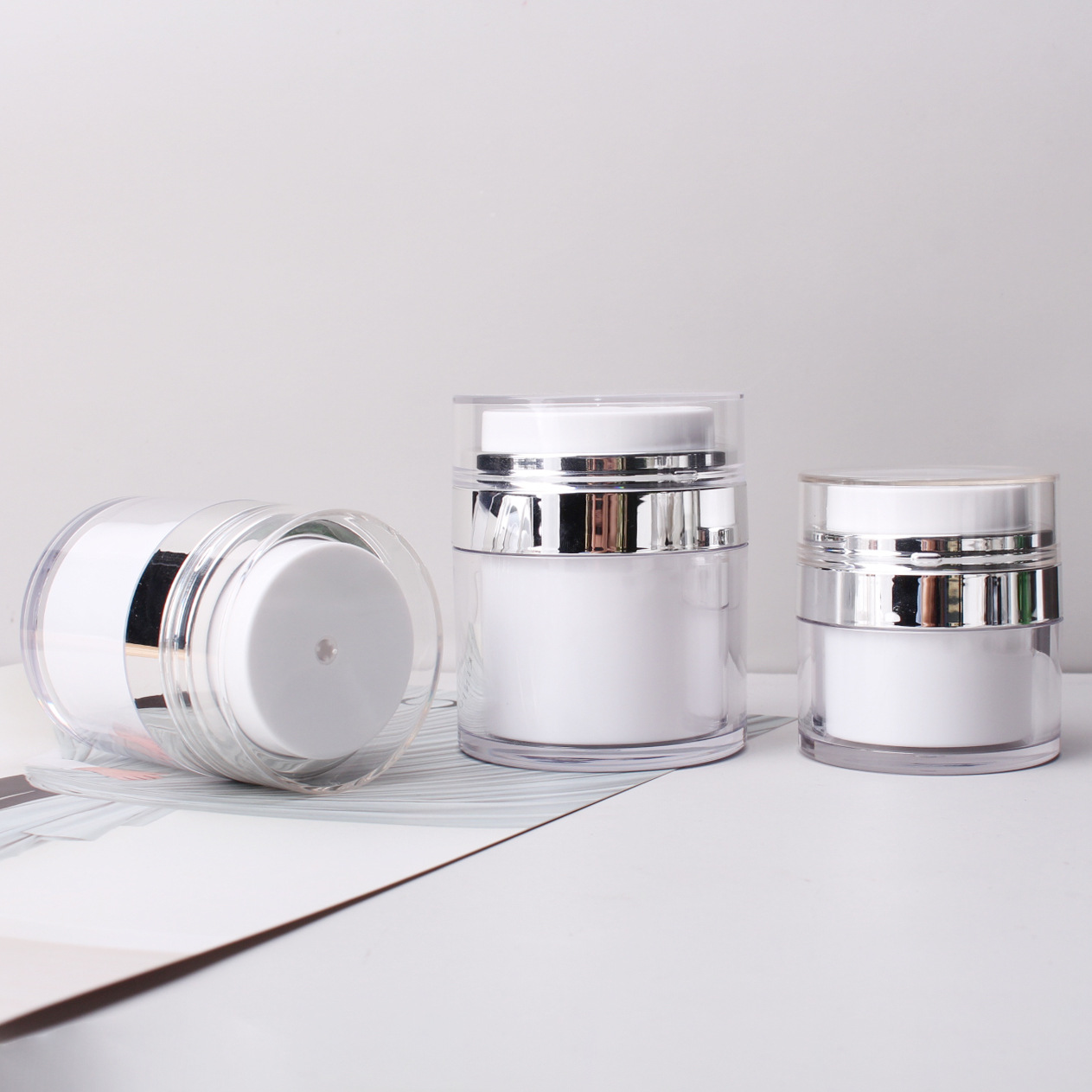 Luxury cosmetic 30g 50g rose gold acrylic airless jar with airless pump moisturizing cream jar