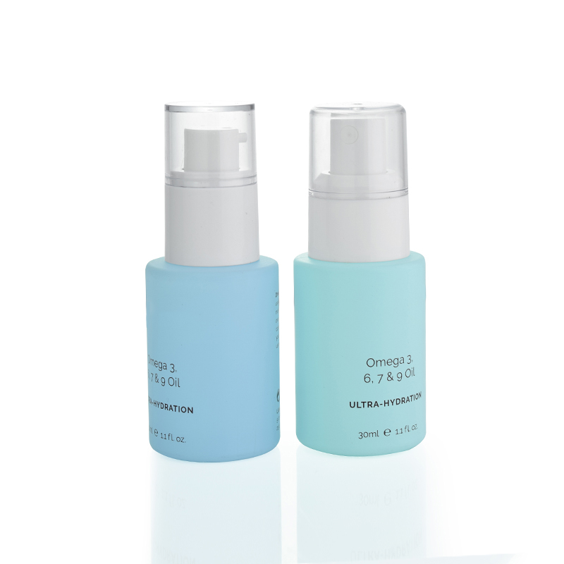 Luxury cosmetic bottle 20ml 30ml colored serum bottle with pump cosmetic glass jars manufacturer