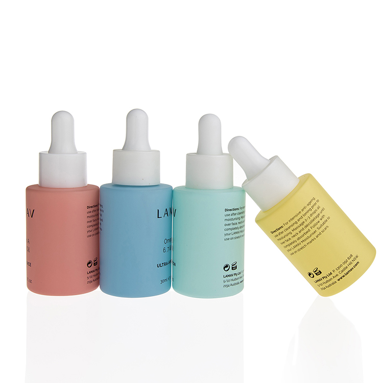 Luxury cosmetic bottle 20ml 30ml colored serum bottle with pump cosmetic glass jars manufacturer