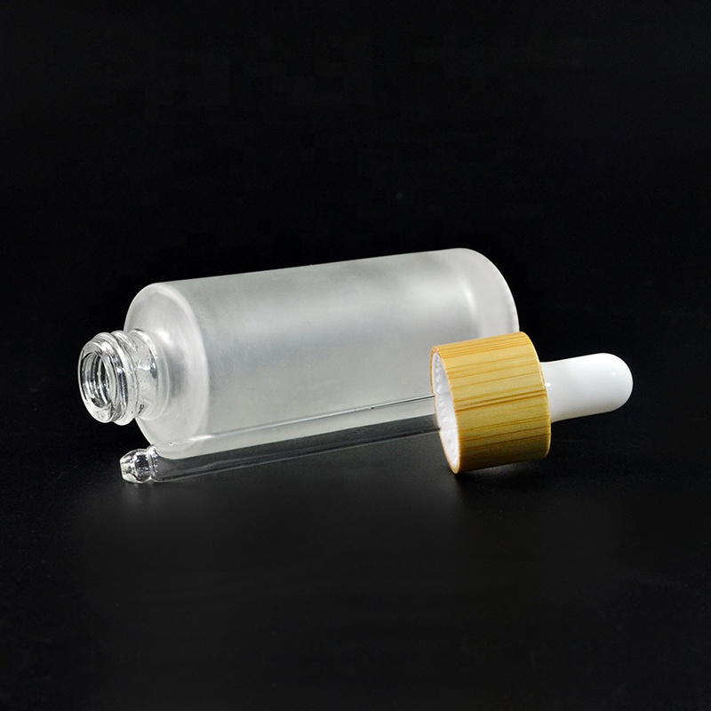 Luxury cosmetic container frosted clear 30ml glass dropper bottle with bamboo cap