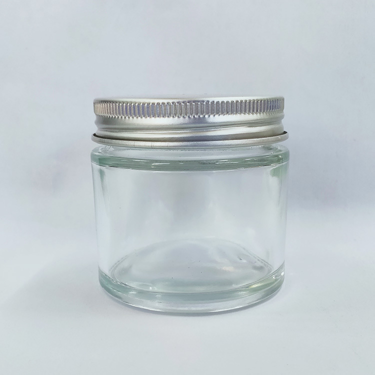 Luxury cosmetic cream glass container clear frosted glass packaging custom 2oz 60g glass jars with sealed silver aluminium lid