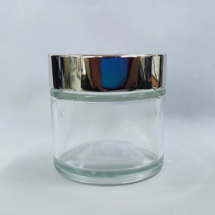 Luxury cosmetic cream glass container clear frosted glass packaging custom 2oz 60g glass jars with sealed silver aluminium lid