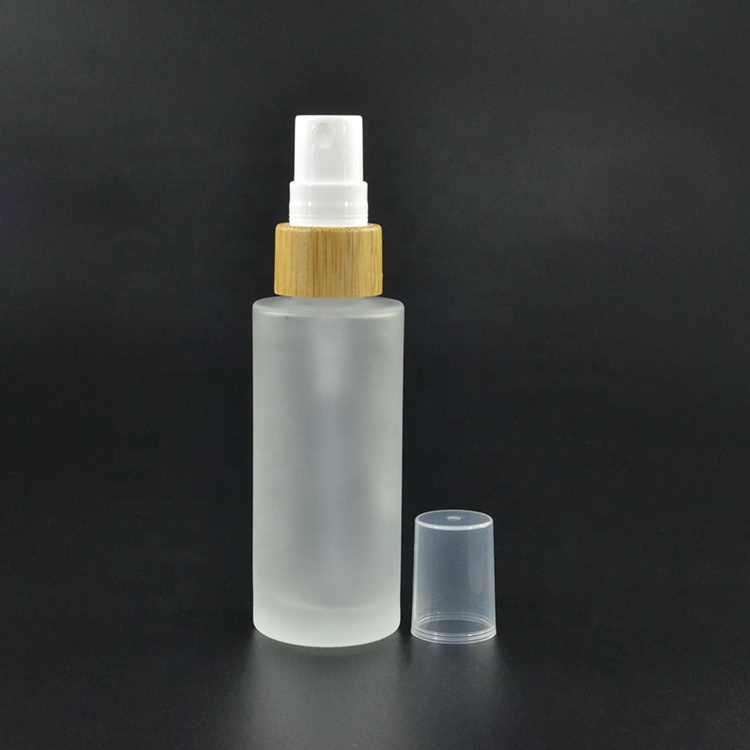 Luxury cosmetic packaging 30ml 50ml 100ml 120ml 150ml clear frosted glass spray bottle with bamboo lid