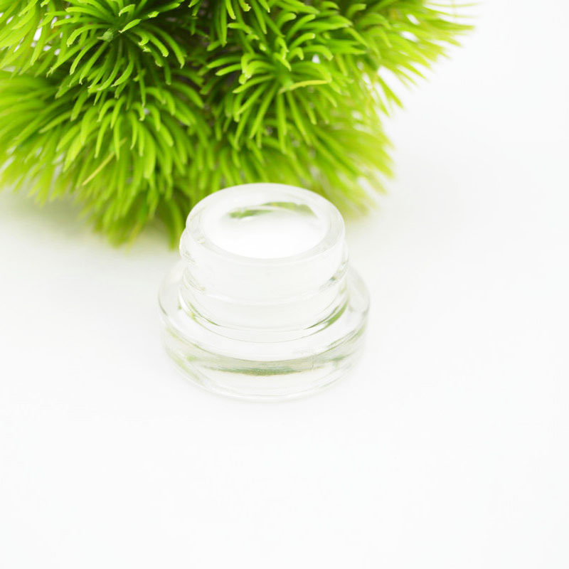 Luxury cosmetic packaging 3g clear round glass cream jar with black childproof lid