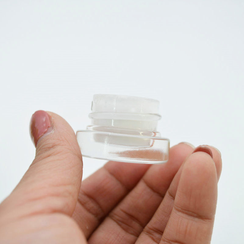 Luxury cosmetic packaging 3g clear round glass cream jar with black childproof lid