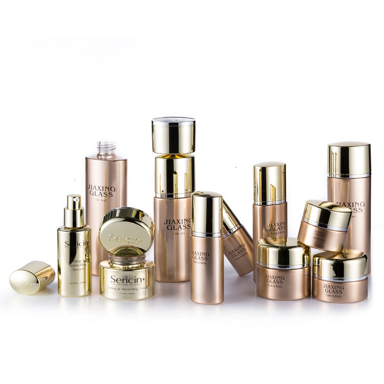 Luxury cosmetic packaging 50ml 80ml 100ml 120ml empty rose gold cosmetic glass lotion cream pump bottles