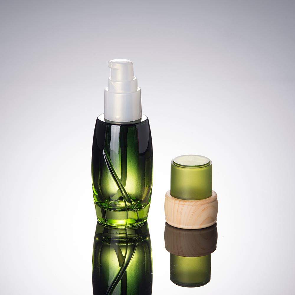 Luxury cosmetic packaging green lotion bottle glass 40ML 100ML 120ML glass bottles for cosmetics
