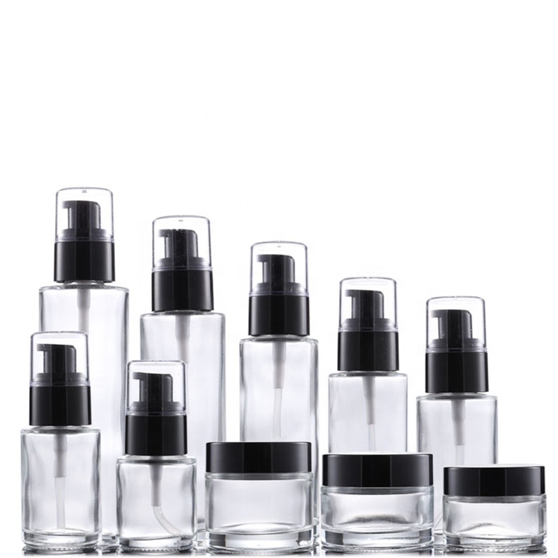 Luxury cosmetic skincare packaging flat shoulder glass bottle 20 ml 30 m 50 ml 100 ml black pump body lotion bottle