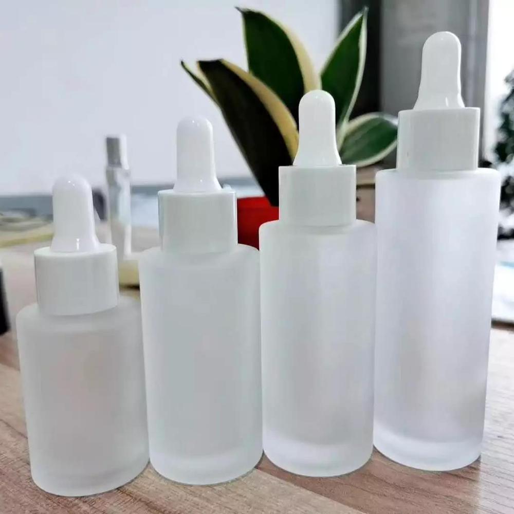 Luxury cosmetic skincare packaging flat shoulder glass bottle 20 ml 30 m 50 ml 100 ml with  pump  lotion bottle
