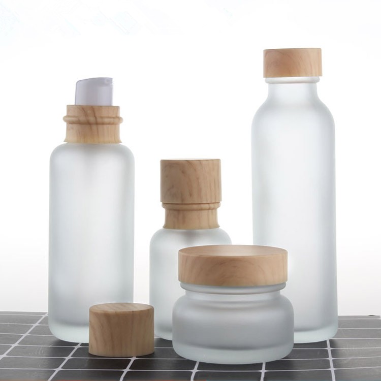 Luxury cream cosmetic glass jar 5g 10g 15g 20g 30g 50g 100g bamboo bottle glass cosmetic container with bamboo caps