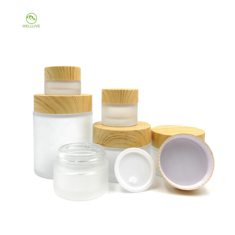 Luxury cream customized frosted 5g 10g 20g 30g 50g 100g white clear glass frost cream jar with wooden lid packaging
