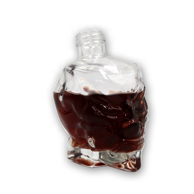 Luxury customized design crystal white super flint glass whisky brandy vodka bottle dropper skull bottle