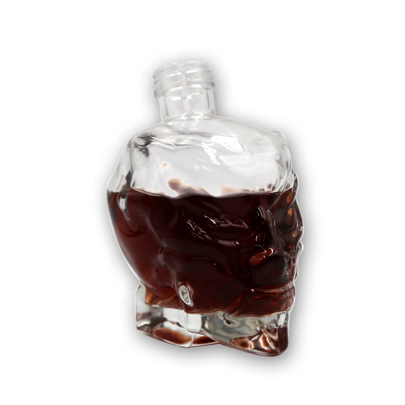 Luxury customized design crystal white super flint glass whisky brandy vodka bottle dropper skull bottle