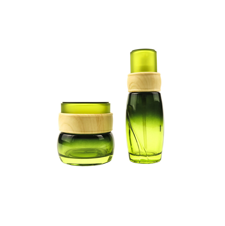 Luxury empty cosmetic glass lotion pump bottle 100g 3.3oz 100ml green gradient serum glass bottle with bamboo pattern pump cap