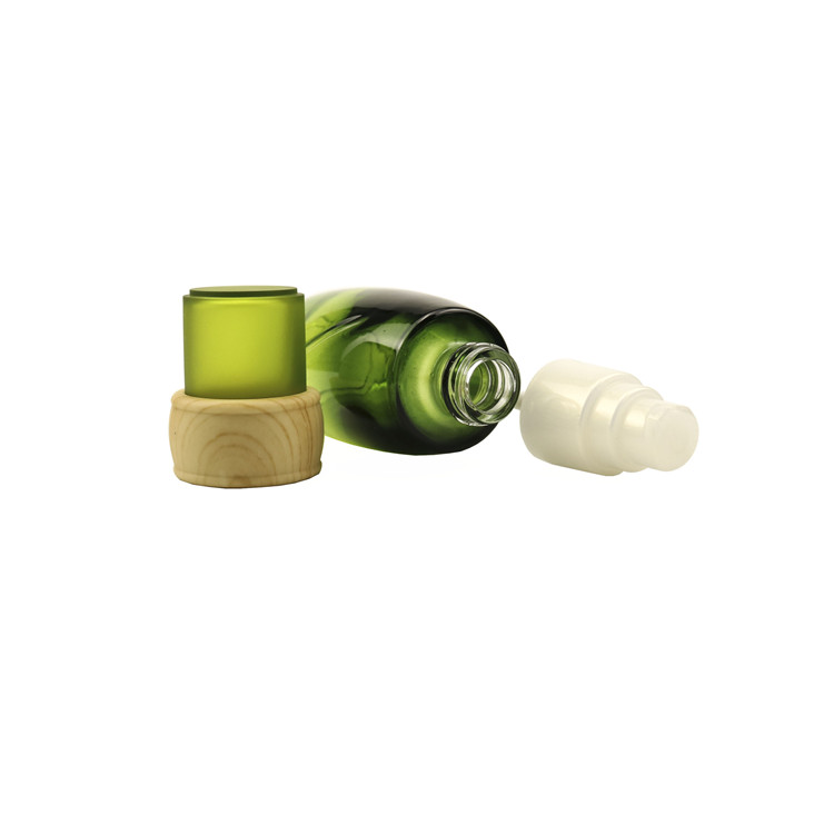 Luxury empty cosmetic glass lotion pump bottle 100g 3.3oz 100ml green gradient serum glass bottle with bamboo pattern pump cap