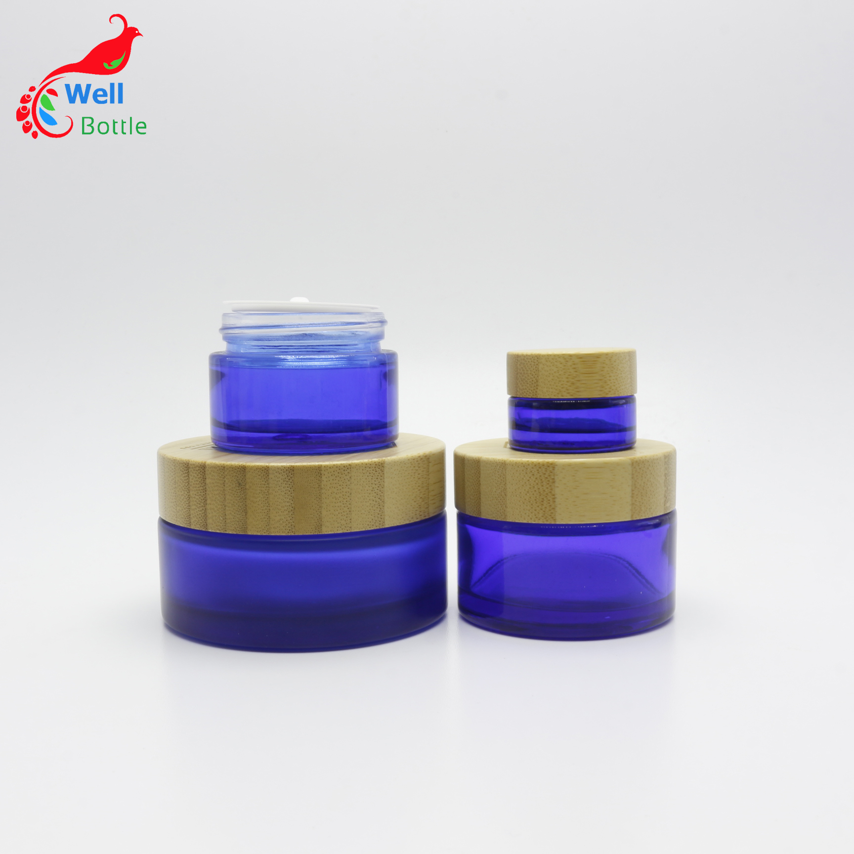 Luxury empty frosted blue glass cosmetic jar 100g custom cobalt glass container with natural wood lid J156E