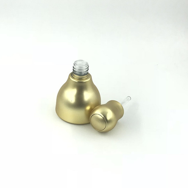 Luxury gold uv frosted dropper bottle with gold cap