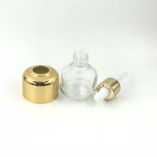 Luxury gold uv frosted dropper bottle with gold cap