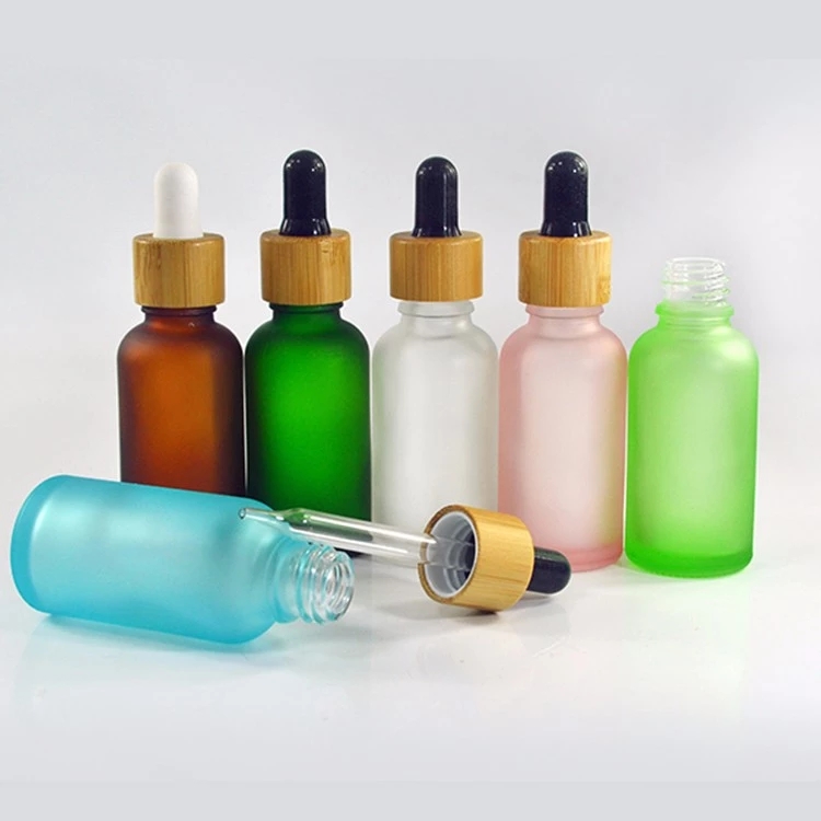 Luxury matte clear black color cosmetic bottle bamboo lid glass dropper bottle