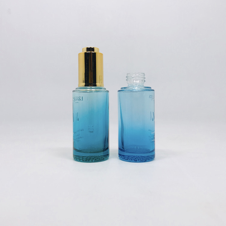 Luxury push button cosmetic serum packaging 20 ml 30 ml face eye blue glass press pump dropper cosmetic serum bottle