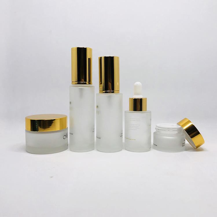 Luxury push button cosmetic serum packaging 20 ml 30 ml face eye blue glass press pump dropper cosmetic serum bottle