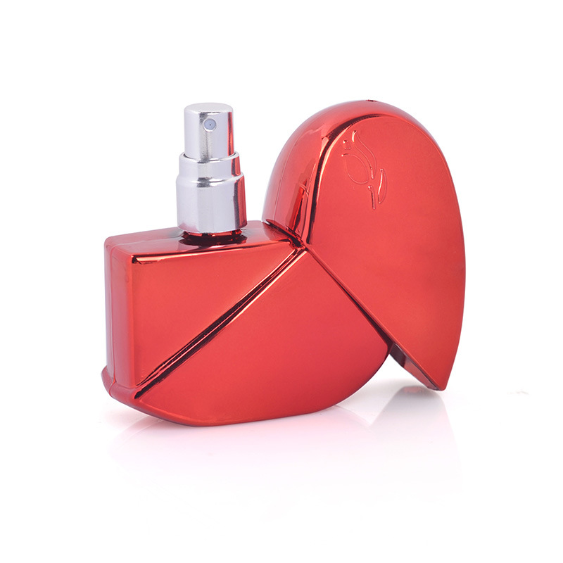 Luxury reusable heart shape Glass perfume pump spray /packing bottle for women