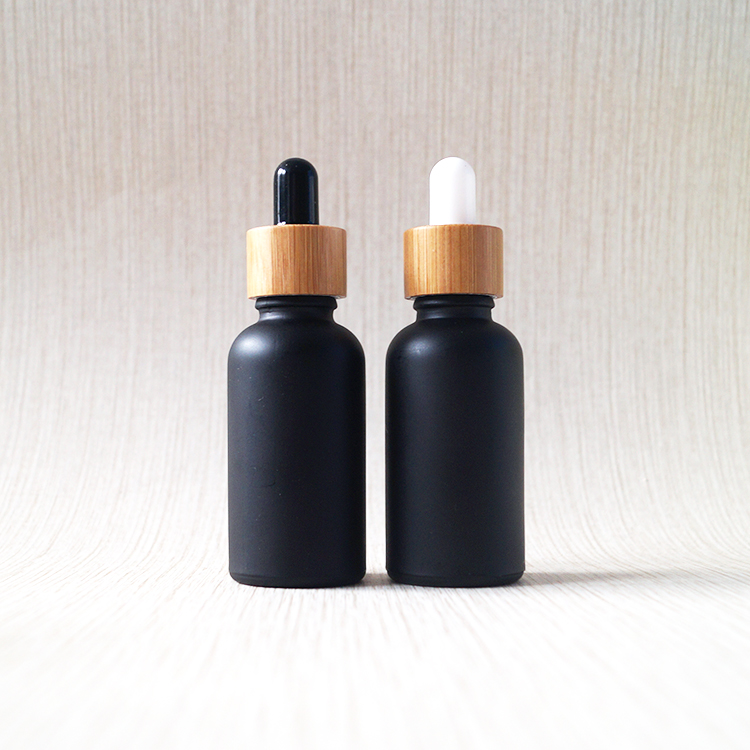 Luxury serum 50ml black frosted bamboo lid glass bottle with paper tube