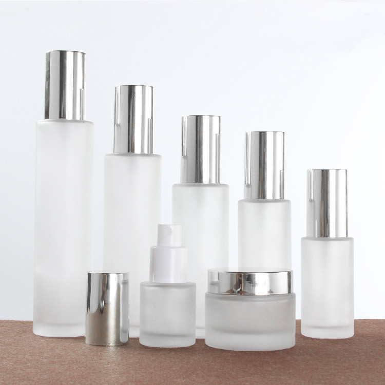 Luxury set frosted glass spray/ lotion bottle and cream jar cosmetic package set with light silver cap