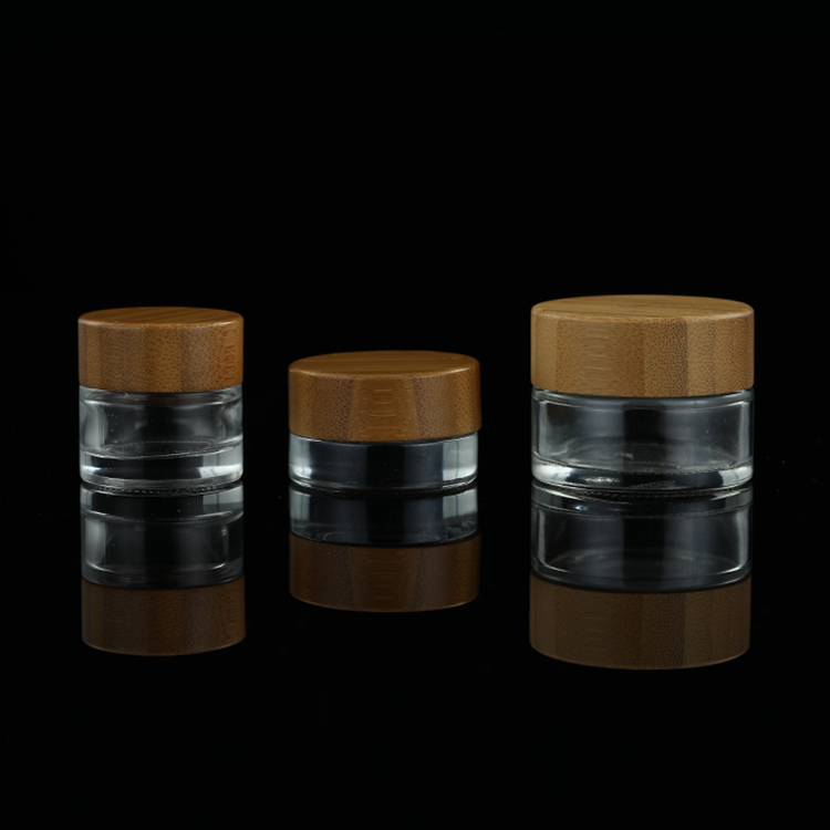 Luxury skincare packaging eco friendly 5g 10g 15g bamboo cosmetic transparent glass jars with wood cap