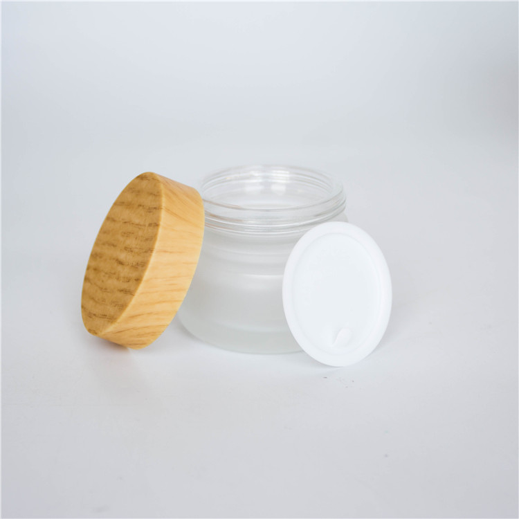 Luxury wholesale 5g 10g 20g 30g 50g 100g 120g 200g matte black skincare cream empty glass jars with gold lid