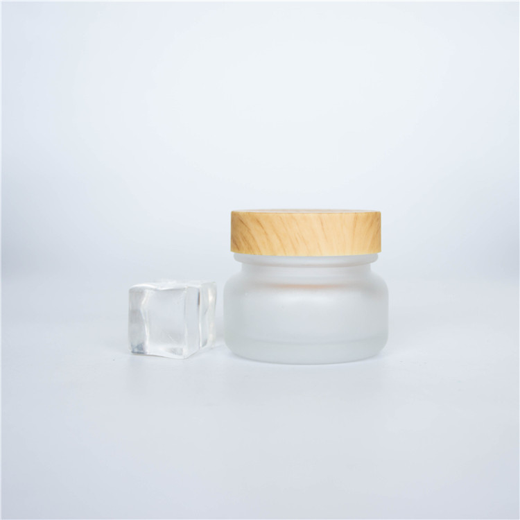 Luxury wholesale 5g 10g 20g 30g 50g 100g 120g 200g matte black skincare cream empty glass jars with gold lid