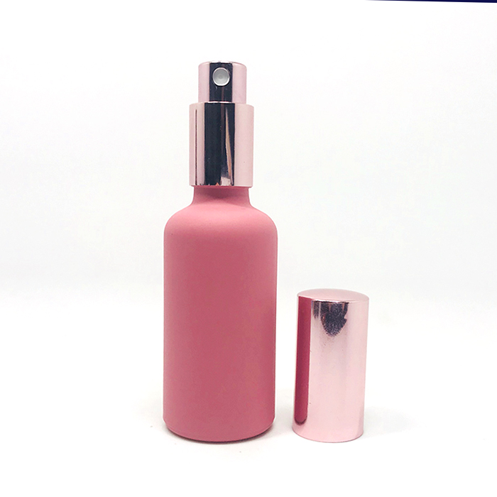 Luxury wholesale 5g 10g 20g 30g 50g 100g 200g amber cosmetic jar empty frosted glass jars with relief logo rose gold lid