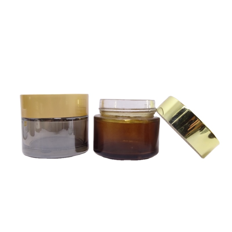 Luxury wholesale 5g 10g 20g 30g 50g 60g 100g 200g transparent black skincare cream empty glass jars with gold lid