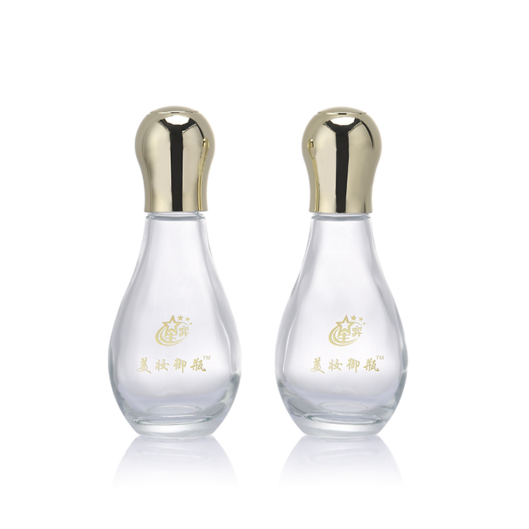 Manufactory direct customized cosmetic glass serum bottle with lid.