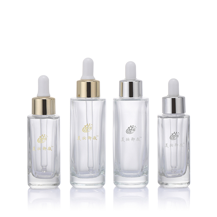 Manufactory direct customized cosmetic glass serum bottle with lid.